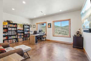 Office with concrete flooring