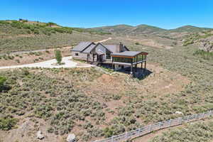 Drone / aerial view featuring a mountain view and a rural view