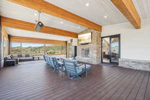 Wooden terrace with an outdoor hangout area