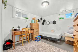 Bedroom with concrete floors