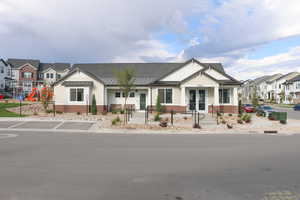 View of front of property featuring a playground