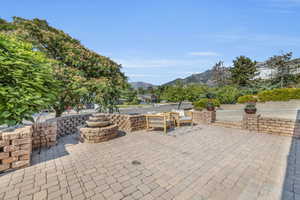 View of patio / terrace with a mountain view