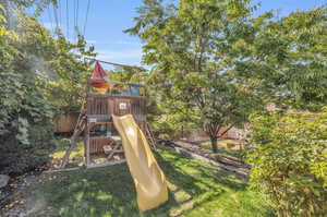 View of yard featuring a playground