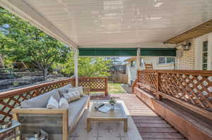 Wooden deck with an outdoor hangout area