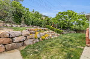 View of yard featuring a playground