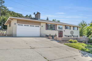 View of front of house with a garage