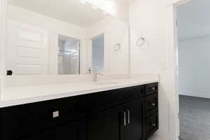 Bathroom featuring vanity