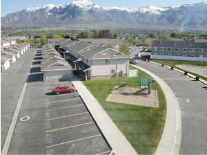 Birds eye view of property featuring a mountain view