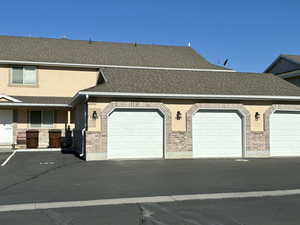 Multi unit property featuring a garage