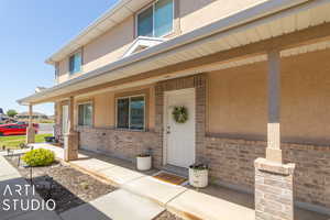 Property entrance featuring a porch