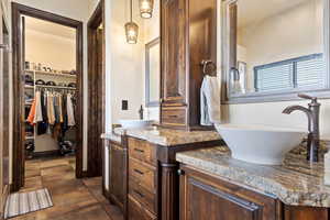 Bathroom featuring vanity and tile patterned flooring