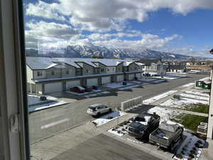 Snowy aerial view with a mountain view