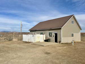 Back of house with a mountain view