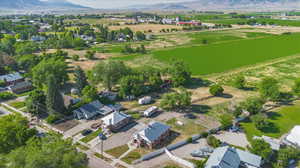 Birds eye view of property with a mountain view