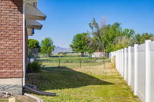 View of yard with a mountain view