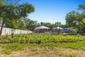 View of yard featuring a trampoline