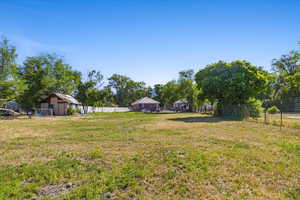 View of yard with an outdoor structure