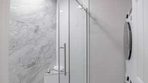 Bathroom featuring a shower with shower door