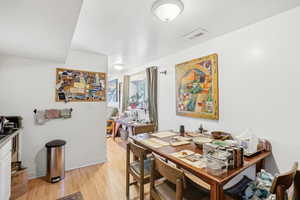 Dining area featuring light wood-type flooring