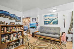 Living area with wood-type flooring