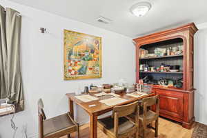 Dining space featuring light hardwood / wood-style floors