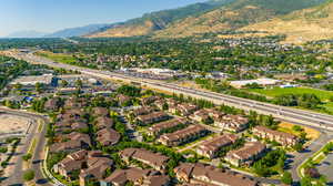 Birds eye view of property featuring a mountain view