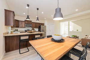 Dining room with light wood-type flooring