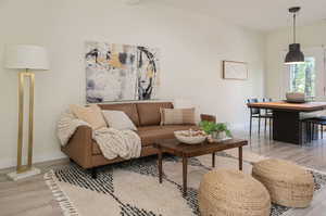 Living room with light wood-type flooring