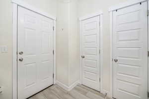 Entryway with light wood-type flooring