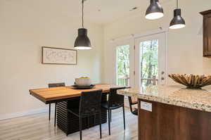 Dining space featuring light hardwood / wood-style floors