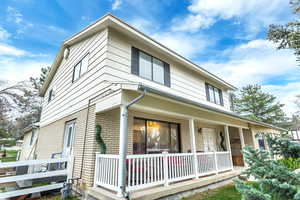 View of front of property with a porch