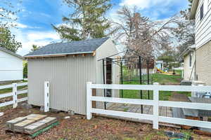 View of outbuilding with a playground