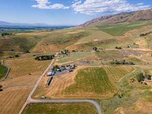 Drone / aerial view featuring a mountain view and a rural view