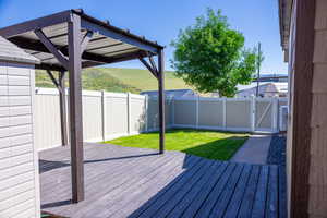 Wooden deck with a yard