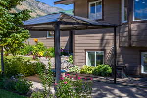 Exterior space with a mountain view and a gazebo