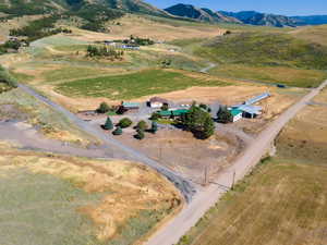 Drone / aerial view featuring a mountain view and a rural view