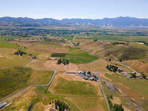 Aerial view featuring a mountain view and a rural view