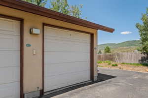 Garage featuring a mountain view