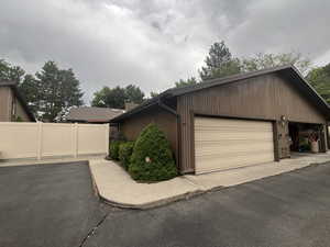 Garage with extra parking space and 2nd entry