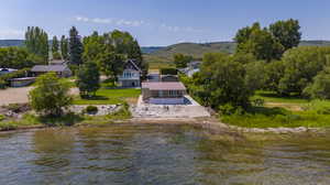 Exterior space featuring a water and mountain view