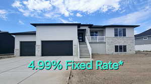 View of front facade with a garage