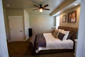 Bedroom featuring carpet floors and a ceiling fan