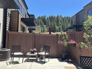 View of patio with mountain-side