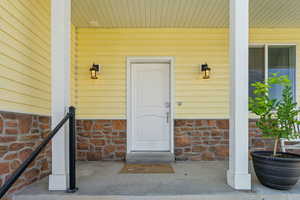 Property entrance featuring a porch