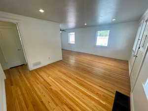 Spacious family room with hardwood floors