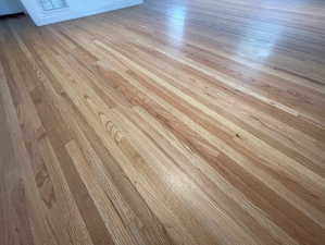 The hardwood floors are in good condition and beautiful