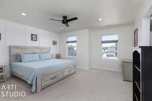 Bedroom featuring light carpet and ceiling fan