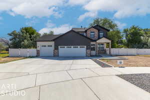 Craftsman-style house featuring a garage