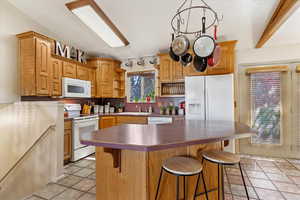 Lovely staggered cabinets and a spacious island.