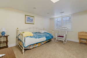 View of carpeted bedroom